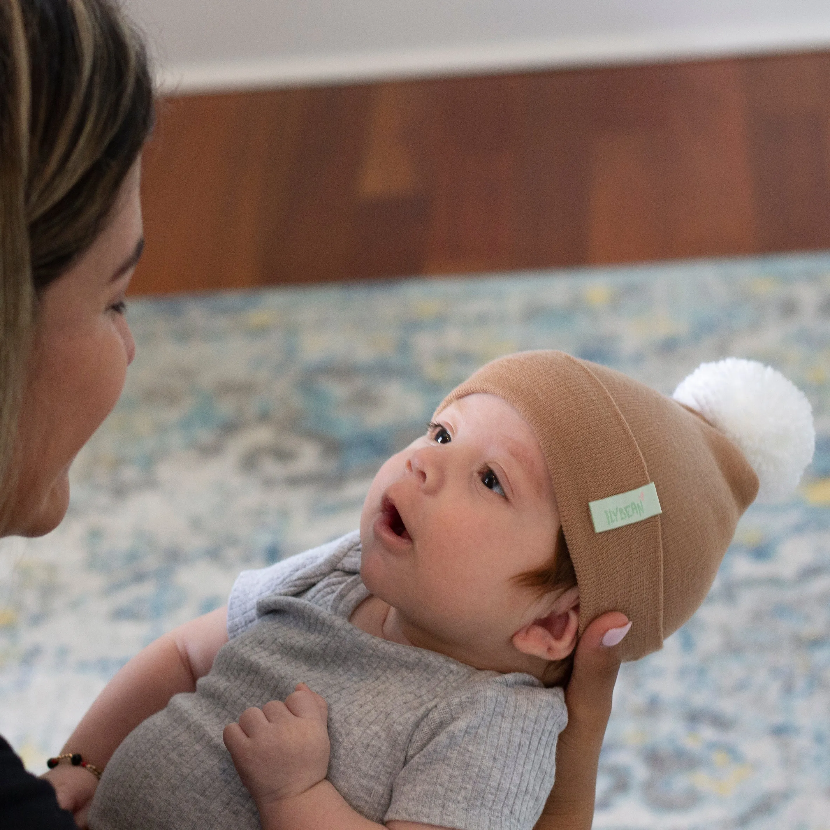 ilybean Tan White Pom Pom Newborn Hospital Hat